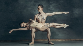 the-young-modern-ballet-dancers-posing-on-gray-JYBC7XQ-min