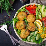 vegetarian-buddha-bowl-raw-vegetables-and-baked-KAYZM53hgf